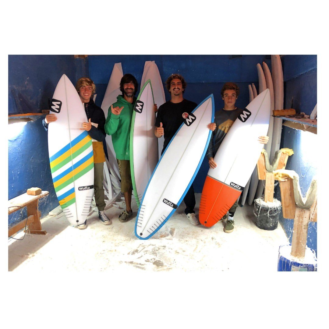 Surfers with their hand shaped Watta boards in Luis's shaping room